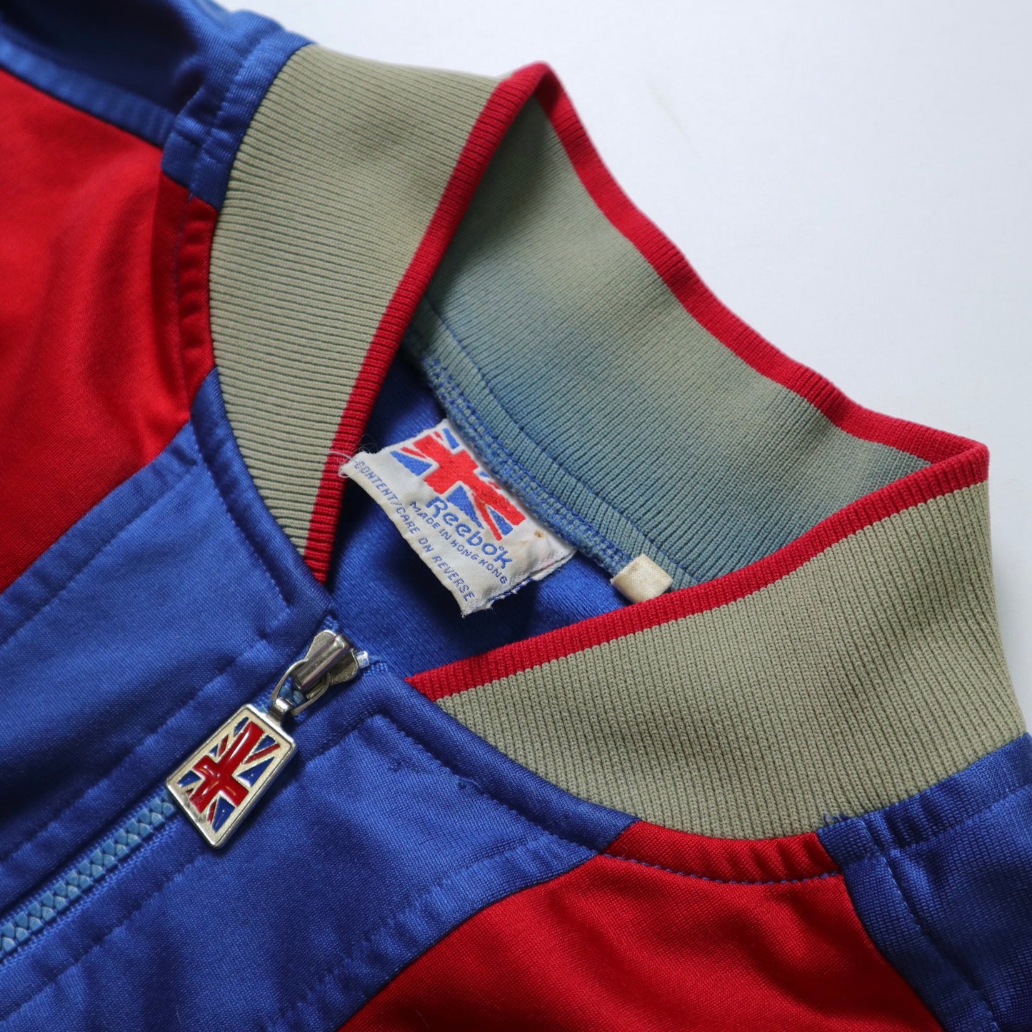 90s Hong Kong-made REEBOK blue and red colorblock sports jacket