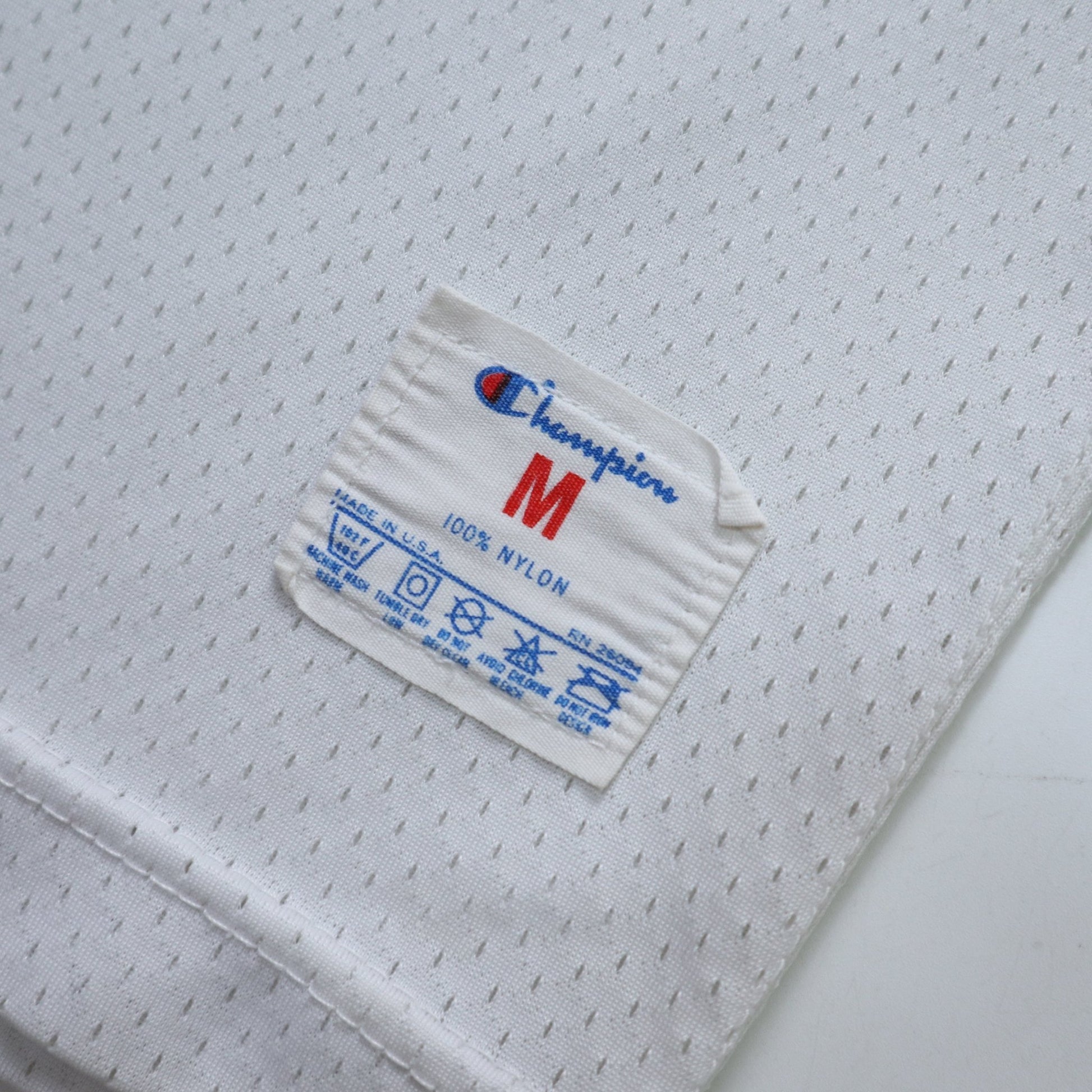 80s 美國製 Champion Assumption University 白色網洞美式足球衣 - 富士鳥古著