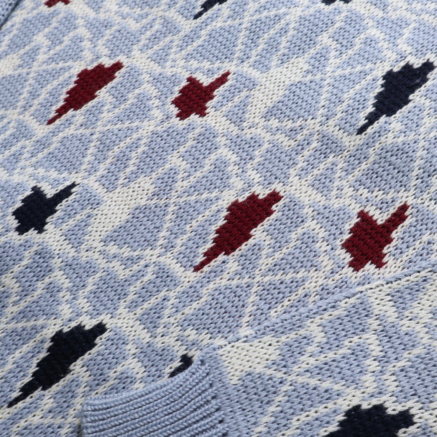 イタリア製のブルーの幾何学模様のトーテム セーター